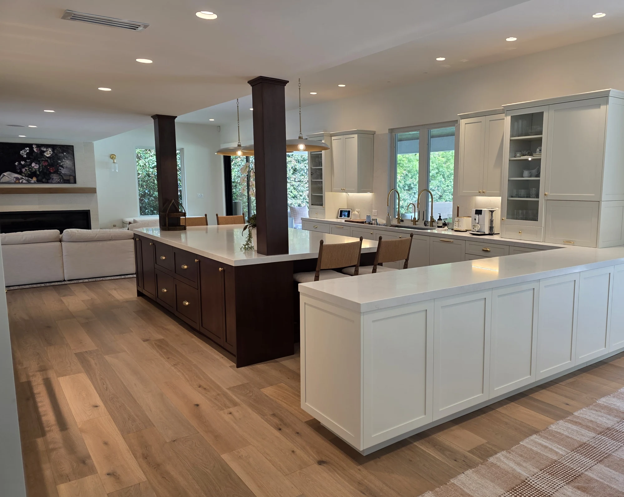 Completed kitchen at The Garden House, with a walnut island and ivory cabinetry